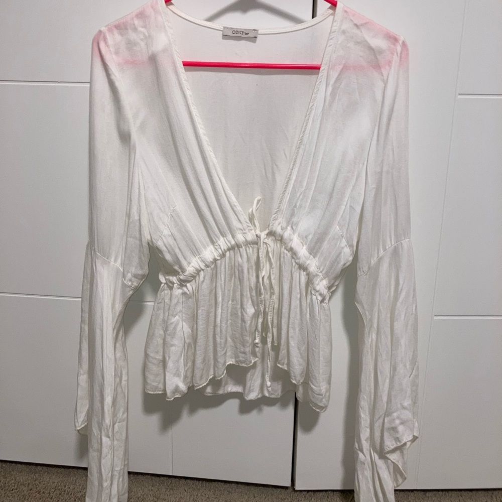 White long sleeved flowy top with front tie
